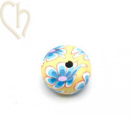 Ball flat in Polymere 12*6mm with flowerdesign blue Yellow